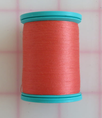 Dark Peach Cotton And Steel Thread